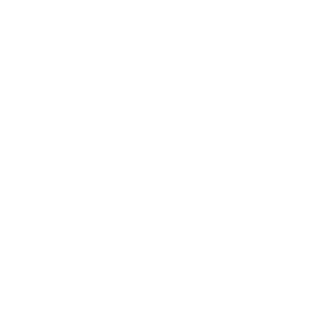 A man is riding a bike with tyre management systems on a hill.